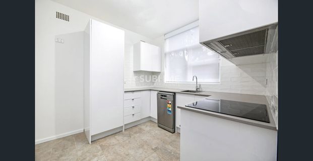 Modern 2 Bedroom Beauty + Garage and Ample Storage! - Photo 1