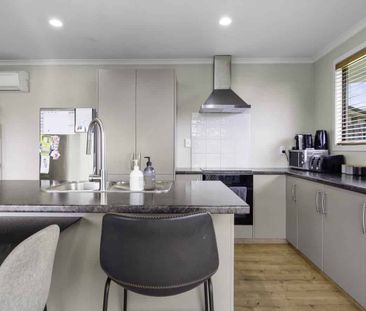 Sun-Filled 4-Bedroom Home with Modern Comforts - Photo 2