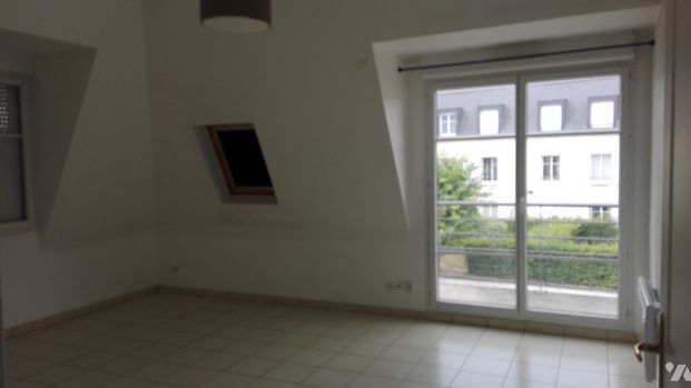Dans résidence sécurisée avec ascenseur, un appartement de type F3 offrant une entrée - Photo 1