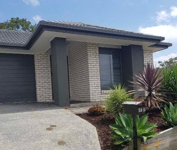 THREE BEDROOM MODERN DUPLEX IN LOGAN RESERVE - Photo 4