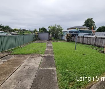 Inconspicuously Spacious home so close to everything. - Photo 5