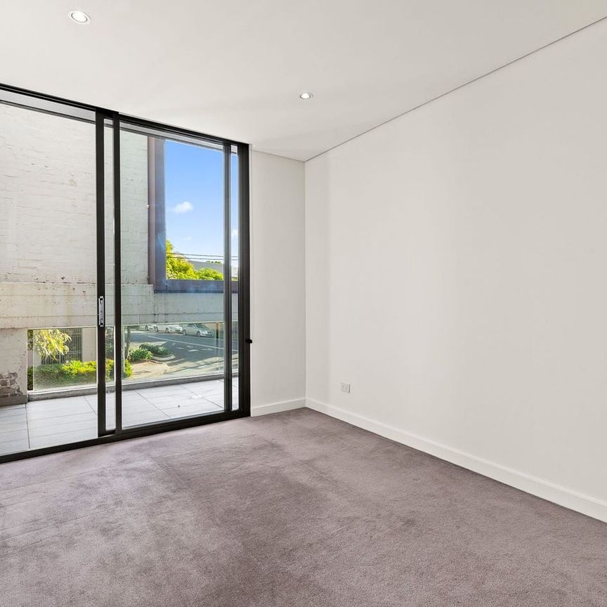 STYLISH TWO BEDROOM COURTYARD RESIDENCE IN SOUGHT AFTER 'OLIVER ELECTRIC' COMPLEX - Photo 1