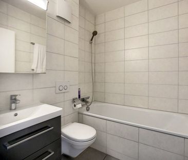 Bel appartement de 2.5 pièces dans un petit immeuble moderne et calme - Photo 3