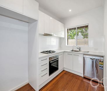 Open the Door to Light-Filled Living with a Private Courtyard Retreat - Photo 4