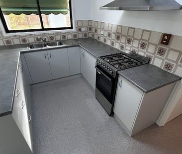 Freshly Painted, Neat Home in Fantastic Drysdale Location - Photo 1