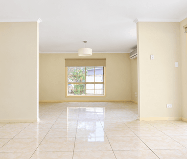 Comfortable Family Home in a Convenient Location - Photo 1