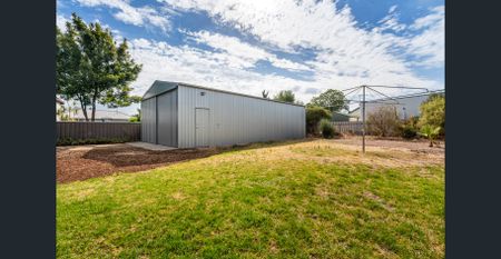 Spacious Family Living with Solar, Large Shed and Expansive Backyard - Photo 4