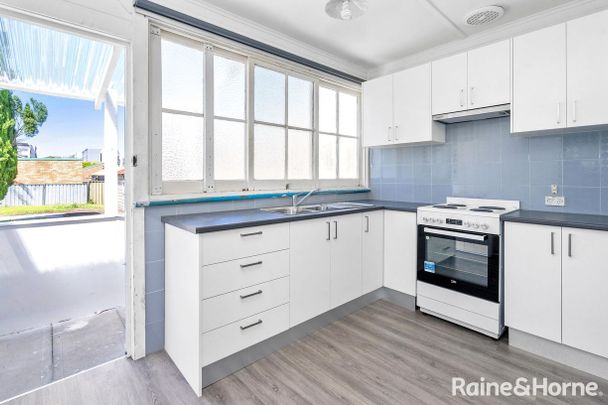 RENOVATED THREE BEDROOM HOME, MINUTES AWAY FROM BELMONT CITY CENTRE - Photo 1