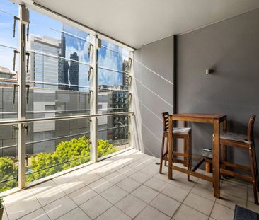 Furnished 1-Bedroom Apartment with City & Street Views - Photo 5