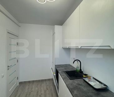 Apartament o camera , loc de parcare, zona Tauti - Photo 2