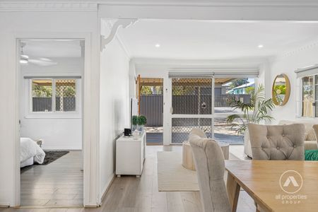 Warm, Welcoming Home with Poolside Living & Flexible Extra Space - Photo 4