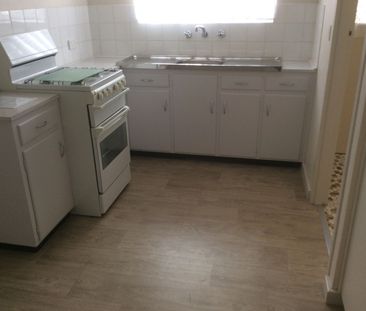 2 bedroom unit with private rear yard in popular location - Photo 3