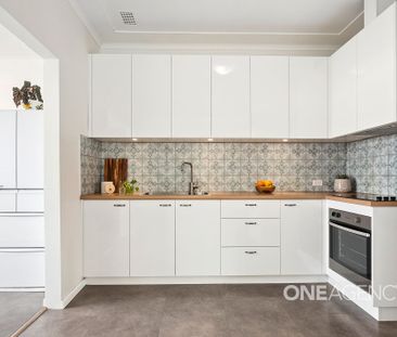 WARM AND WELCOMING FOUR-BEDROOM HOME - Photo 6