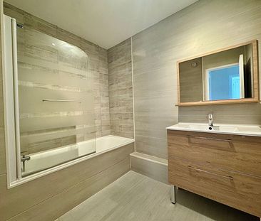 Location Appartement 4 pièces 74m² - Photo 3