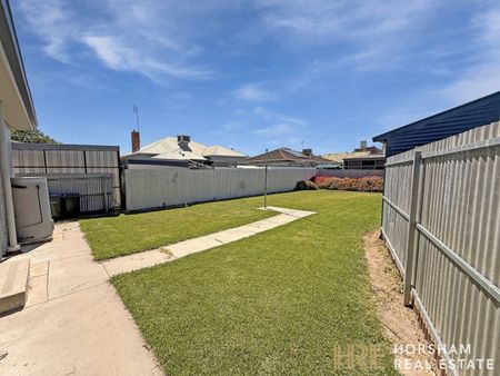 Modern Three-Bedroom Home Close to the CBD - Photo 2