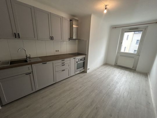 Gepflegte 2 Zimmer Wohnung mit Blick in den grünen Innenhof! - Photo 1