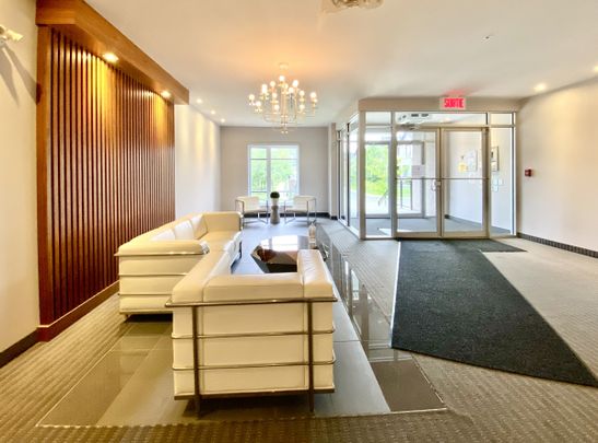 Penthouse sur 2 étages avec stationnement intérieur. - Photo 1