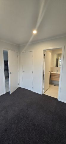 This near new two bedroom, two bathroom townhouse on Dey Street offers modern, low maintenance living in a highly sought after area. - Photo 2