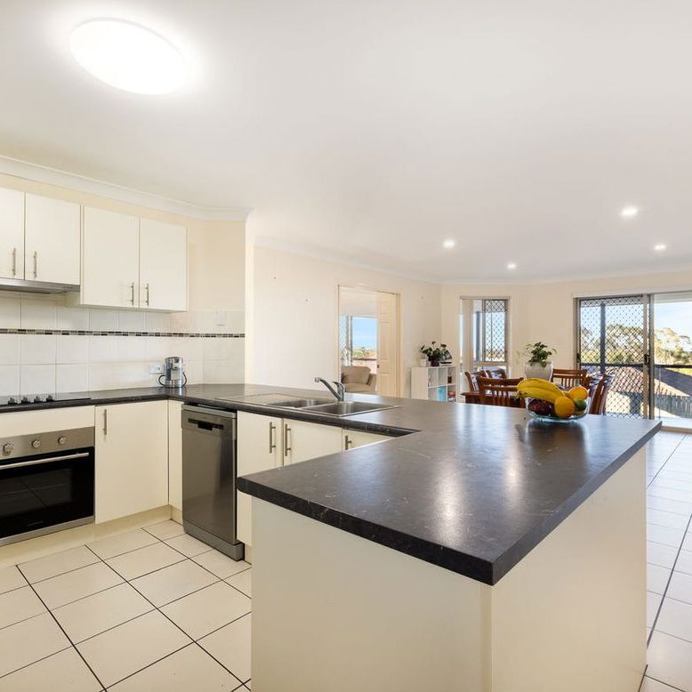 Elevated Family Home with Stunning Glasshouse Mountain Views - Photo 1