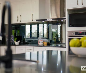 Spacious Family Home in Convenient Springwood Location - Photo 1