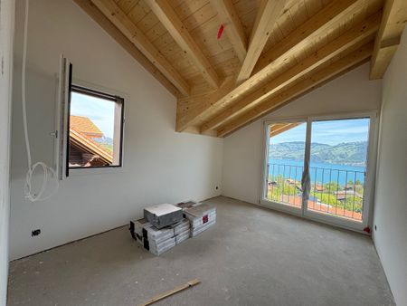 Herrliche Sicht auf den Thunersee, Grosszügige Terrasse (ca. 30 m²), Erstbezug im Neubau mit vier Einheiten - Photo 4