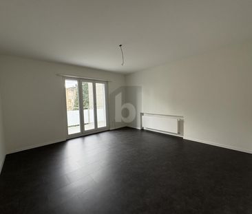 LIGHT-FLOODED WITH A LARGE BALCONY - Photo 1