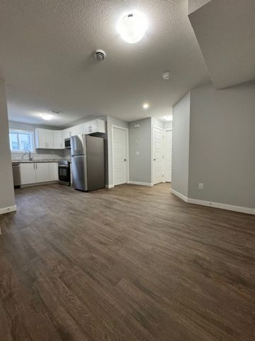 1 Bedroom Lower Unit in Rosewood - Photo 2