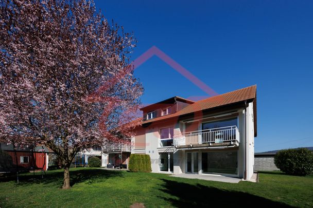 Appartement de 4.5 pièces au rez-de-chaussée avec grande terrasse et jardin - Photo 1