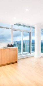 Luxury Sub-Penthouse | 2 Bed, 2 Bath + 2 Parking | Stunning Views - Photo 4