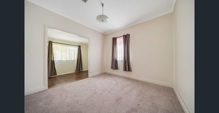 Convenient & Comfortable Living Opposite the Train Station! - Photo 4