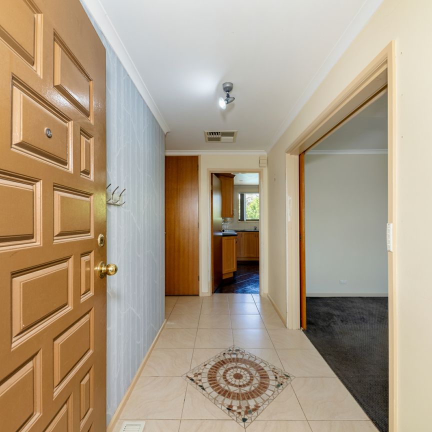 Stunning Three Bedroom Family Home with Pool, Solar and Large Gardens in a Prime Location! - Photo 1