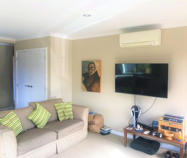 This modern and warm two-bedroom unit is positioned in a quiet cul-... - Photo 2