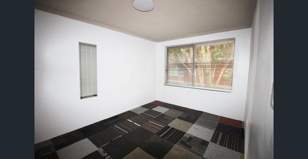 Bright Top Corner Unit Off Main Road Close to City Hub - Photo 1