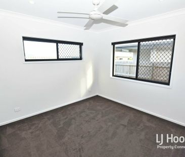 MODERN FAMILY HOME WITH MULTIPLE LIVING AREAS! - Photo 6