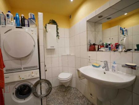 Wunderschöne 2-Zimmer-Wohnung mit Einbauküche und traumhaftem Garten in Ratingen-Ost - Photo 2