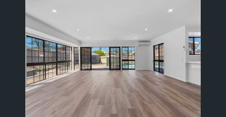 STYLISH LOW MAINTENANCE FAMILY HOME WITH POOL! - Photo 3