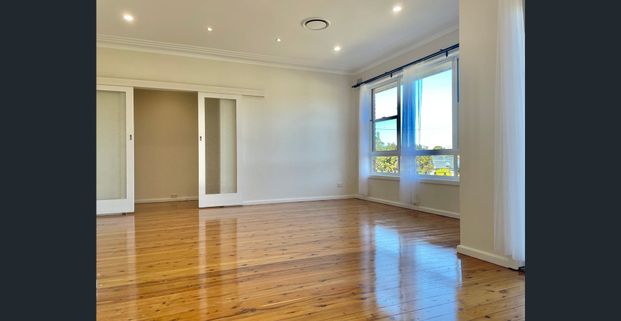 Single Storey Brick Home with floorboards throughout - Photo 1