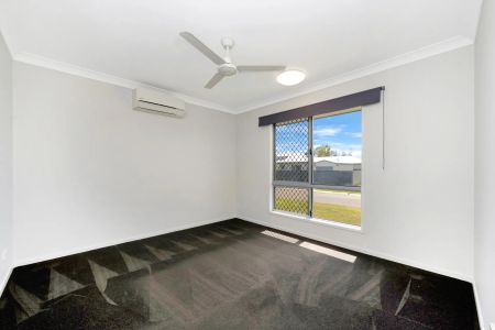 Spacious 4-Bedroom Home with Modern Comforts - Photo 3