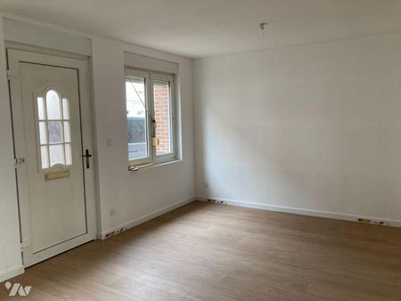 Une maison à louer à STEENBECQUE (59189) Maison mitoyenne rénovée comprenant un salon/séjour, u... - Photo 2