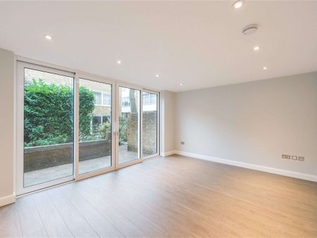 A modern and well-presented four-bedroom end of terrace house, located within a sought-after road in the heart of Primrose Hill. - Photo 3