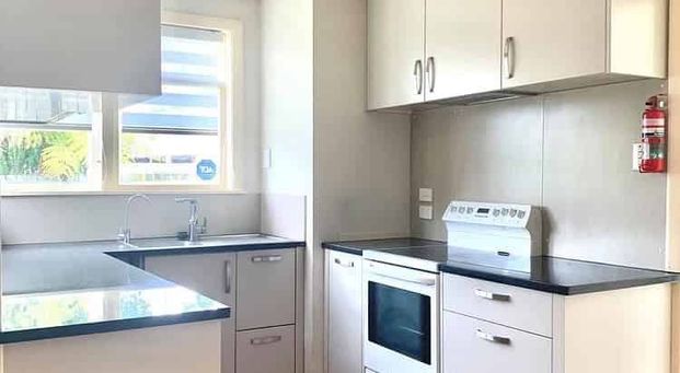 Central Location! 3-Bedroom Home - Photo 1