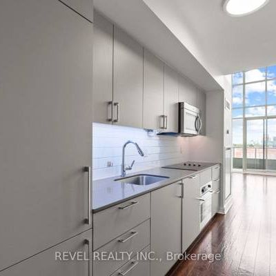 High ceilings parking included floor to ceiling windows! - Photo 4