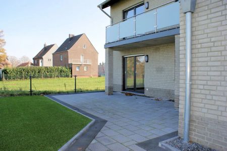 Erdgeschosswohnung mit Einbauküche, Erdwärme und Garten mit unbezahlbarem Blick - Photo 5