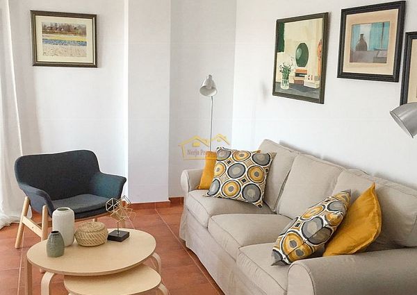 Bright 3-Bedroom Apartment with Parking and Pool, Available for Long-Term Rental in Frigiliana