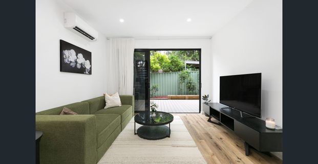 Modern Townhome in a Prime Convenient Location! - Photo 1