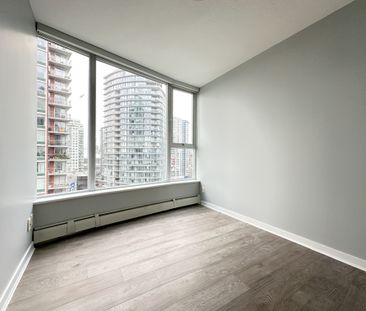 Bright 2 Bed High Rise Condo With False Creek Views - Photo 2