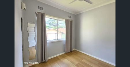 Updated Four Bedroom Home with Ample Yard & Garden - Photo 2