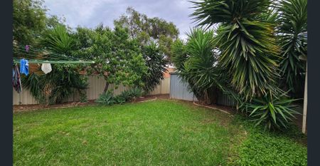 Neat 3BR Family Home with Gardens & Workshop - Photo 3