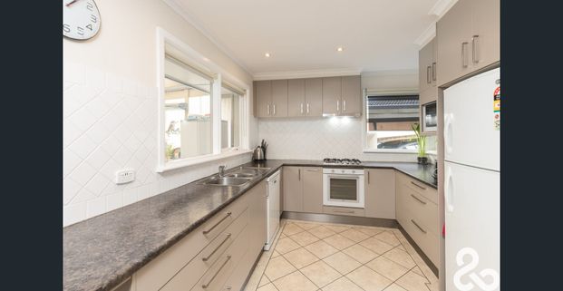 This family-friendly home offers instant charm, space and comfort. - Photo 1