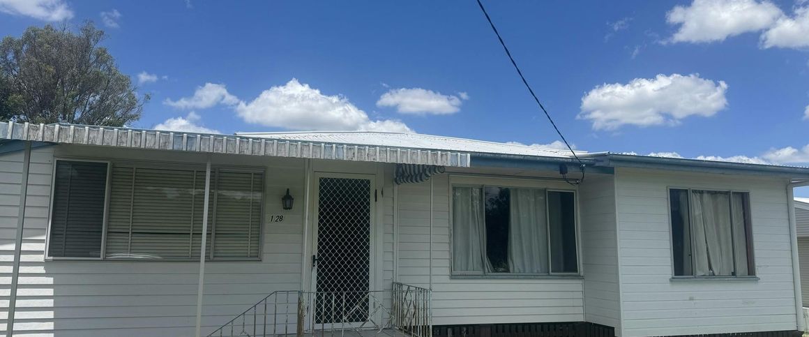 Large 5-Bedroom Home with Secure, Fully Fenced Yard - Photo 1